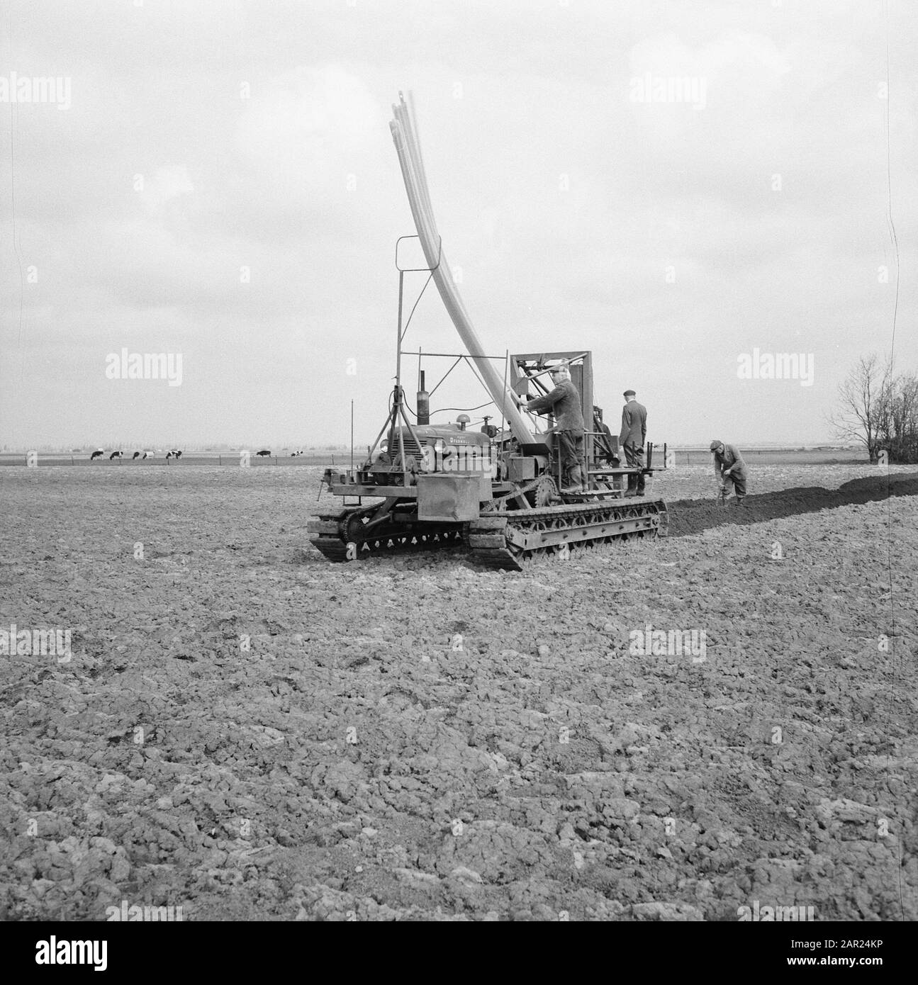 drainage, machines, drains, plastic, workers Date undated Keywords