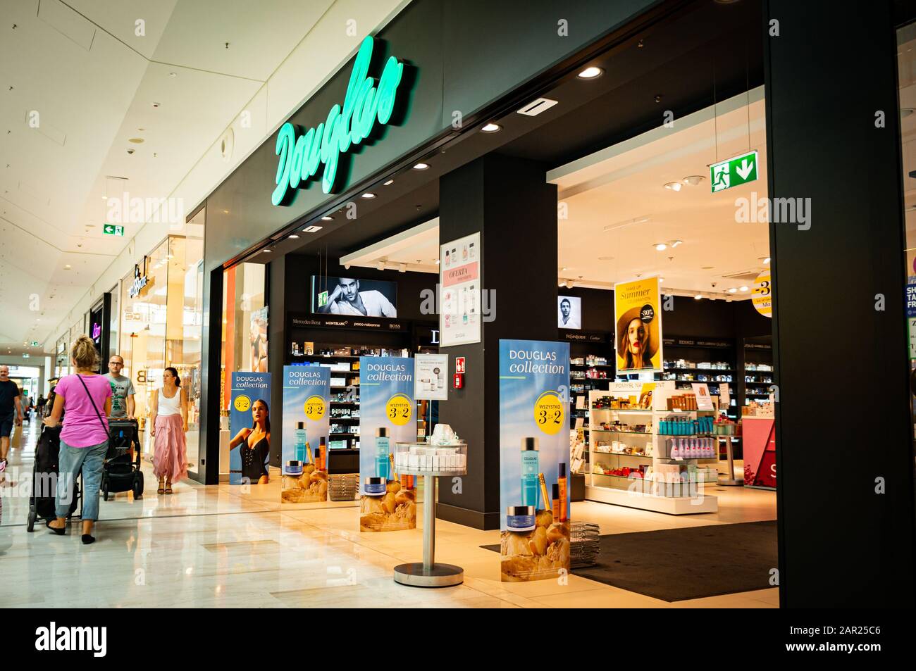 POZNAN, POLAND - Aug 03, 2019: Front entrance of a Douglas store selling  perfumes and other cosmetics in the Posnania shopping mall. People walking  ne Stock Photo - Alamy