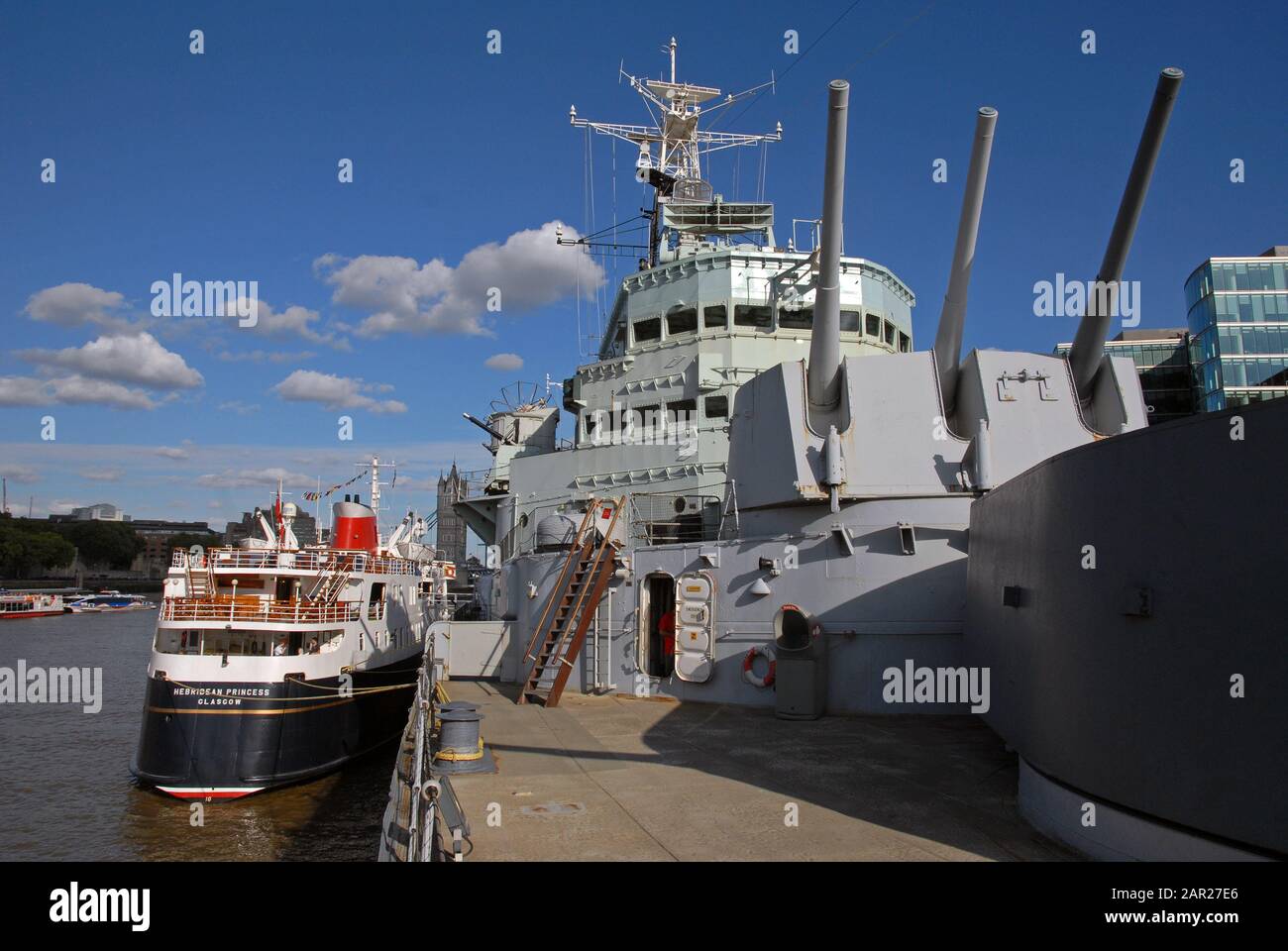 HEBRIDEAN PRINCESS alongside HMS BELFAST in the UPPER POOL, River Thames, LONDON Stock Photo