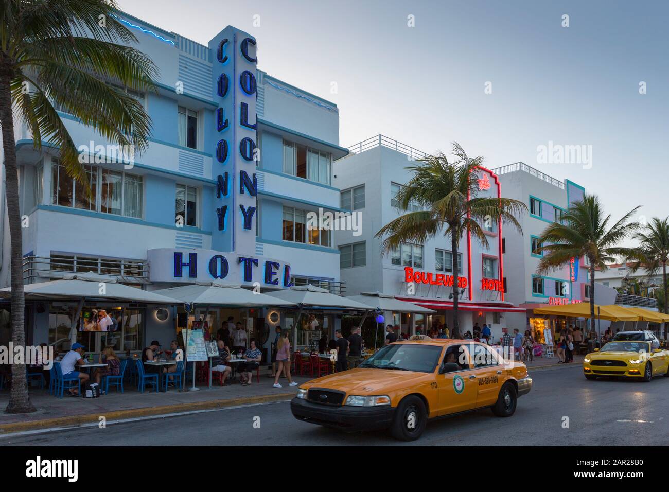 Ocean Drive restaurants and Art Deco architecture at dusk, South Beach