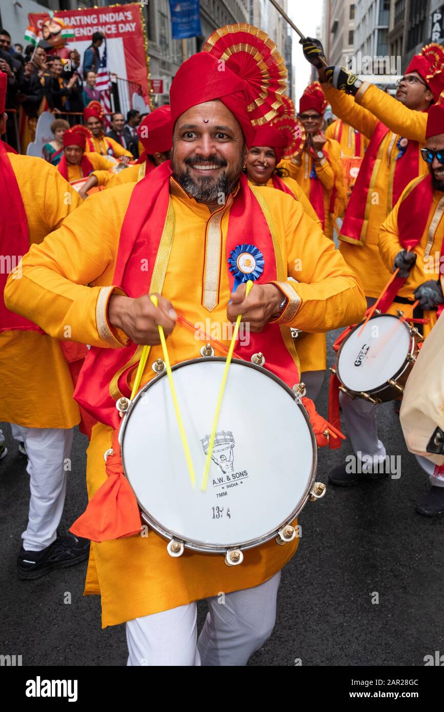 An exuberant Hondu drummer in the Jallosh band prepares to march in the India Day Parade in Manhattan, New York City. Stock Photo