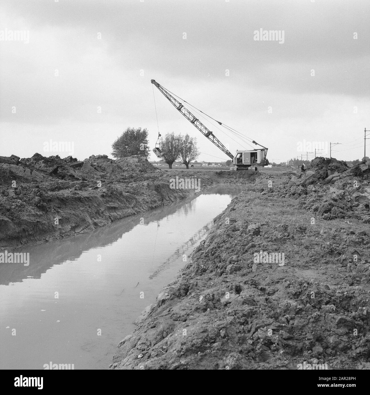 npc, pipelines, draglines, dig trenches Date: 1965 Keywords: draglines, dig trenches, npc, pipelines Stock Photo