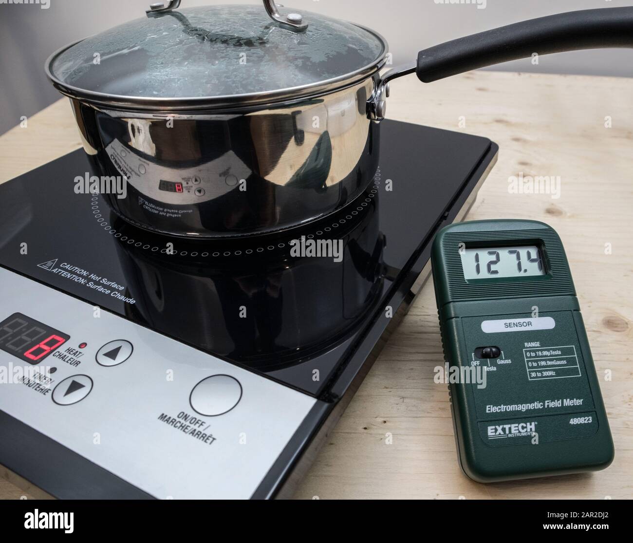 Extremely high levels of low frequencies, measured close to a induction cooking surface.. Stock Photo