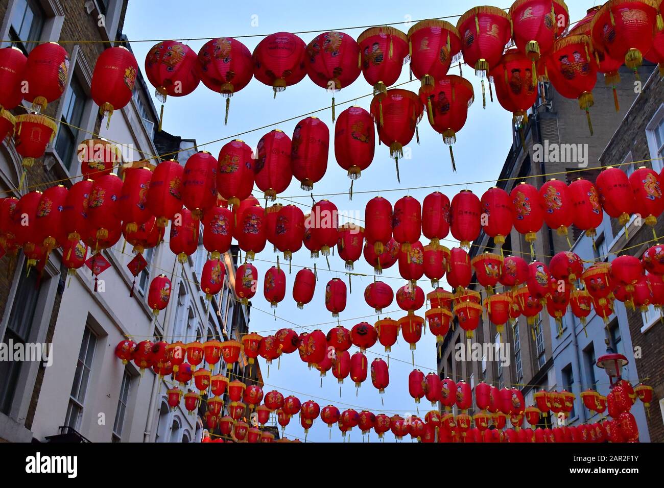 London, UK. 25th Jan 2020. Hundreds of people watching Lion dance and browsing and buying Chinese New Year  souvignier gifts of the New Year of the Rat, in London Chinatown on 25th January 2020, London, UK Credit: Picture Capital/Alamy Live News Stock Photo