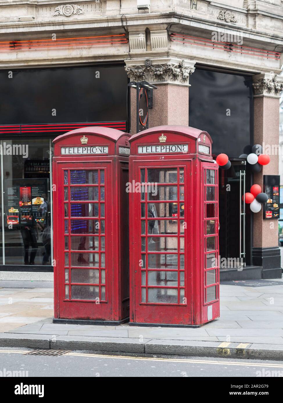 Two Vintage Red Phone Call Boxes in Central London Stock Photo Alamy
