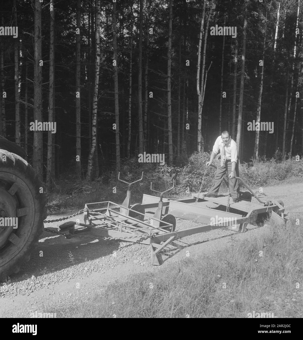 An agricultural tool as trailer of a tractor Date: undated Keywords: trailers, woodworking, machines, tools Stock Photo