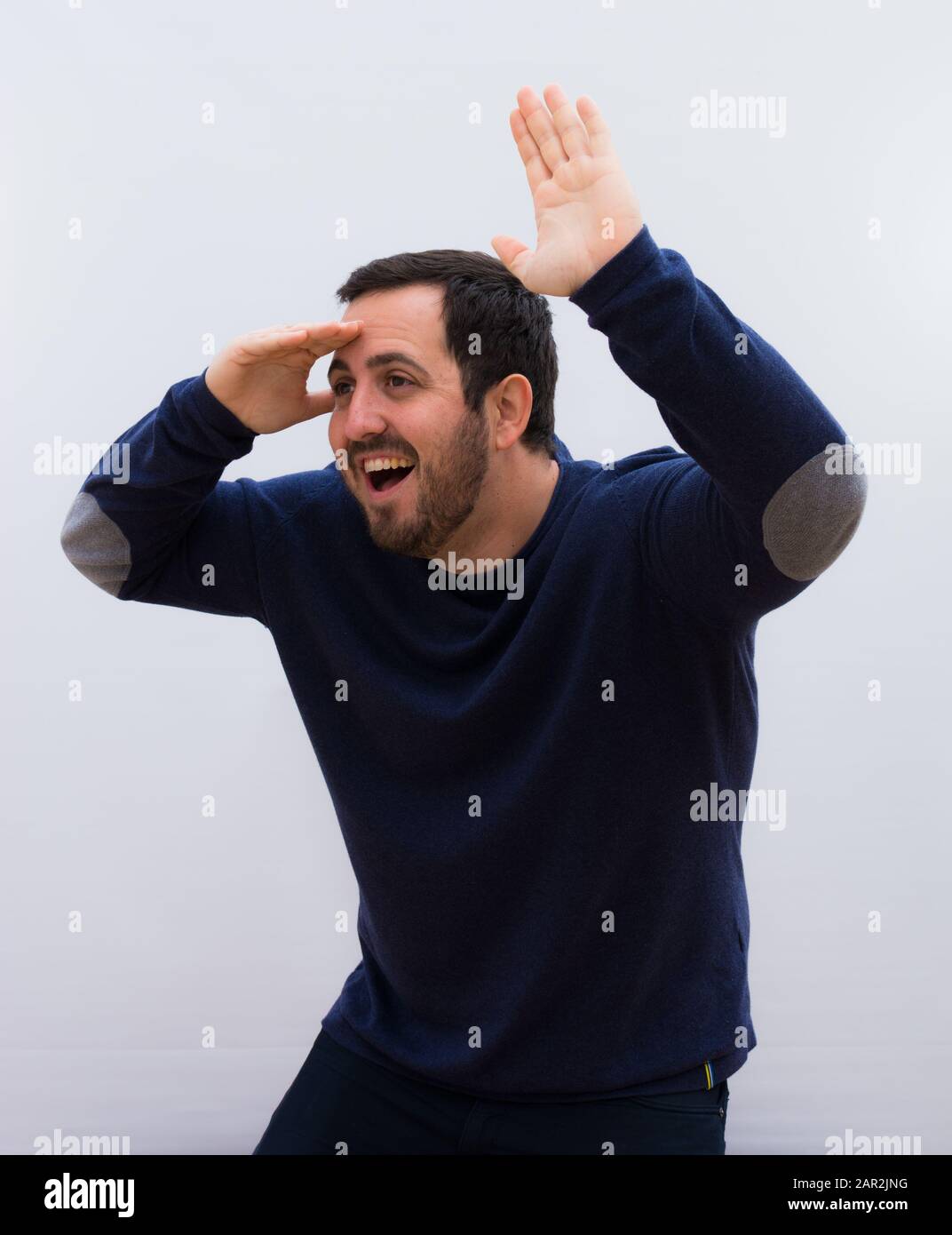Cheerful beard young man celebrating hi-res stock photography and ...
