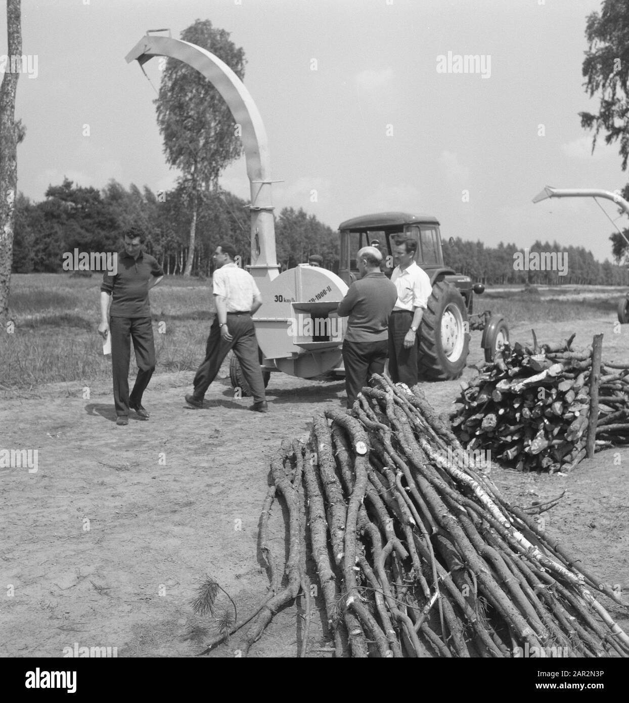 machines, tools, workers, logs Date: undated Keywords: workers, logs, machines, tools Stock Photo