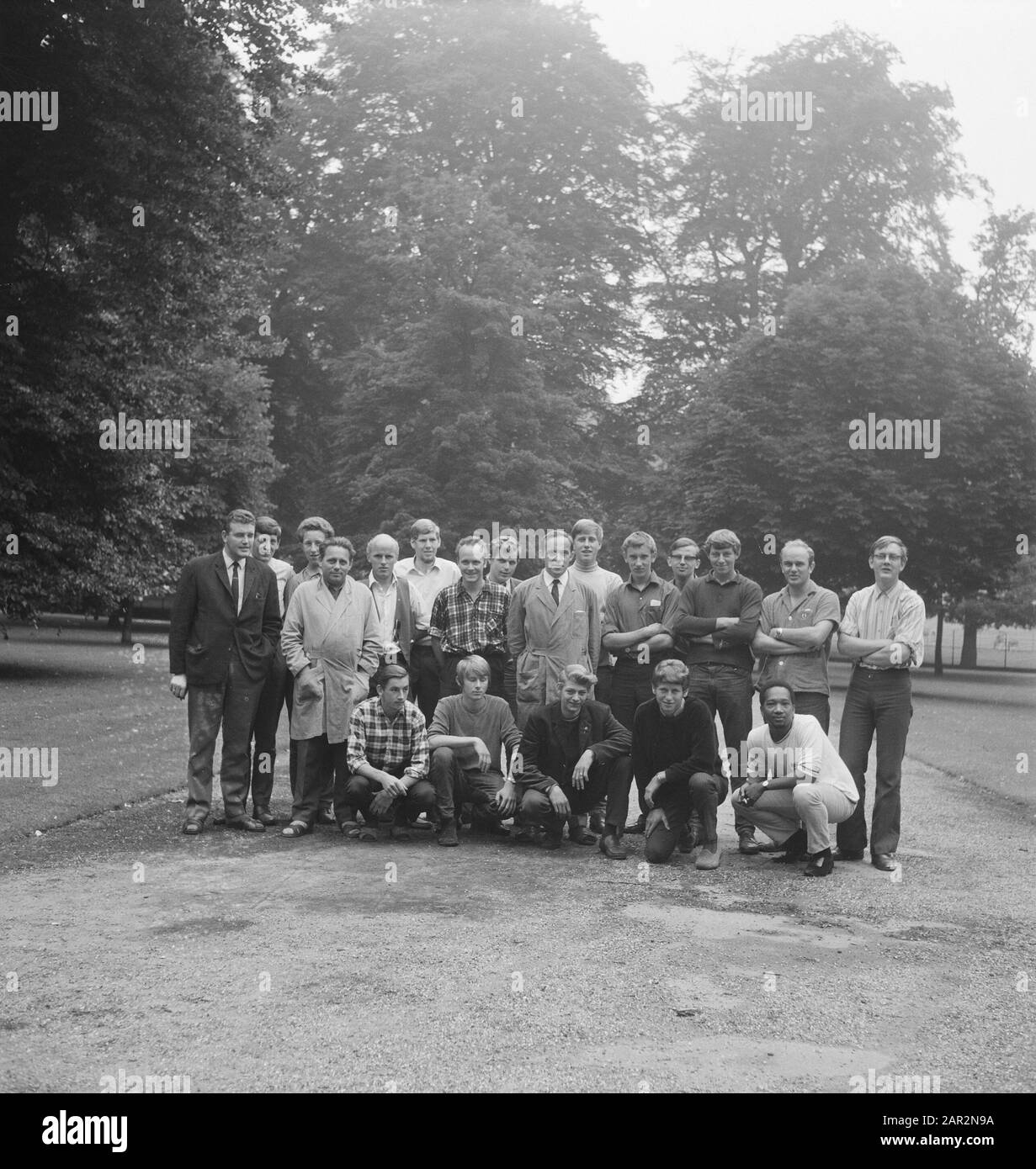 men, trees, group photos Date: undated Keywords: trees, group photos, men Stock Photo