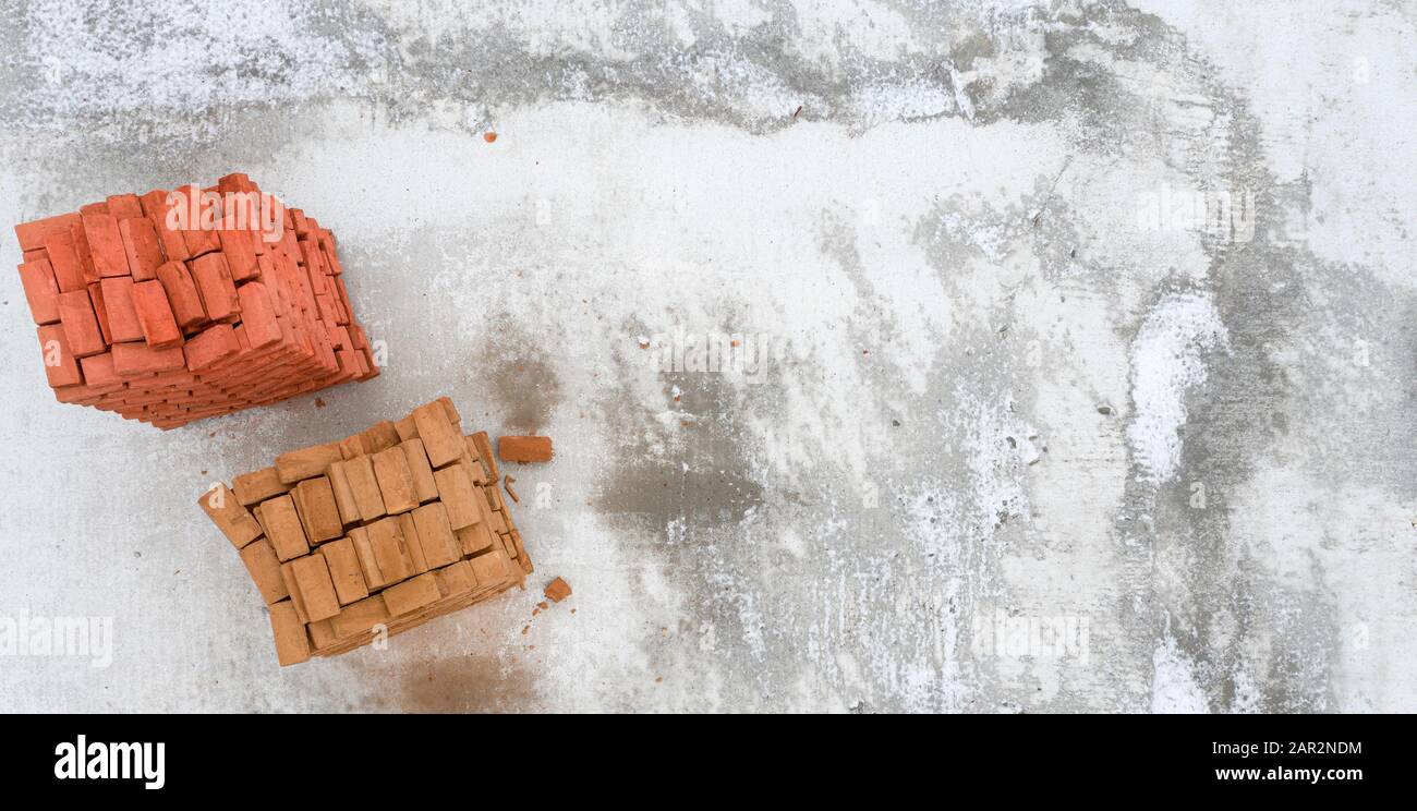 Concept Of Construction Two Pallets On White Concrete Surface