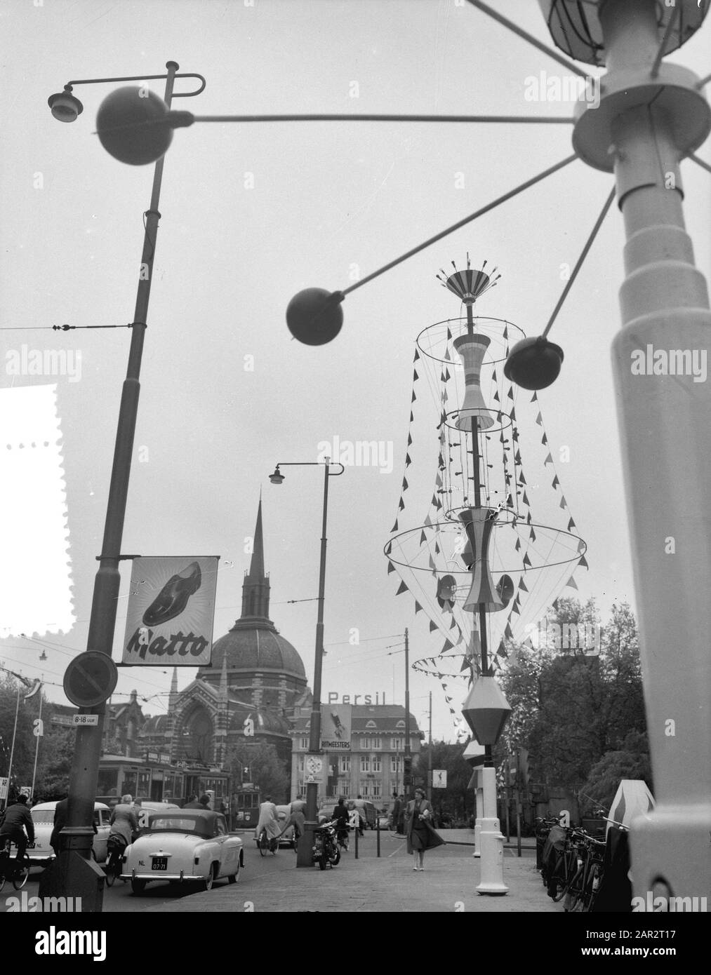 Light party decorations downtown. The Time Date: May 31, 1956 Keywords: inner cities Personal name: The Time Stock Photo