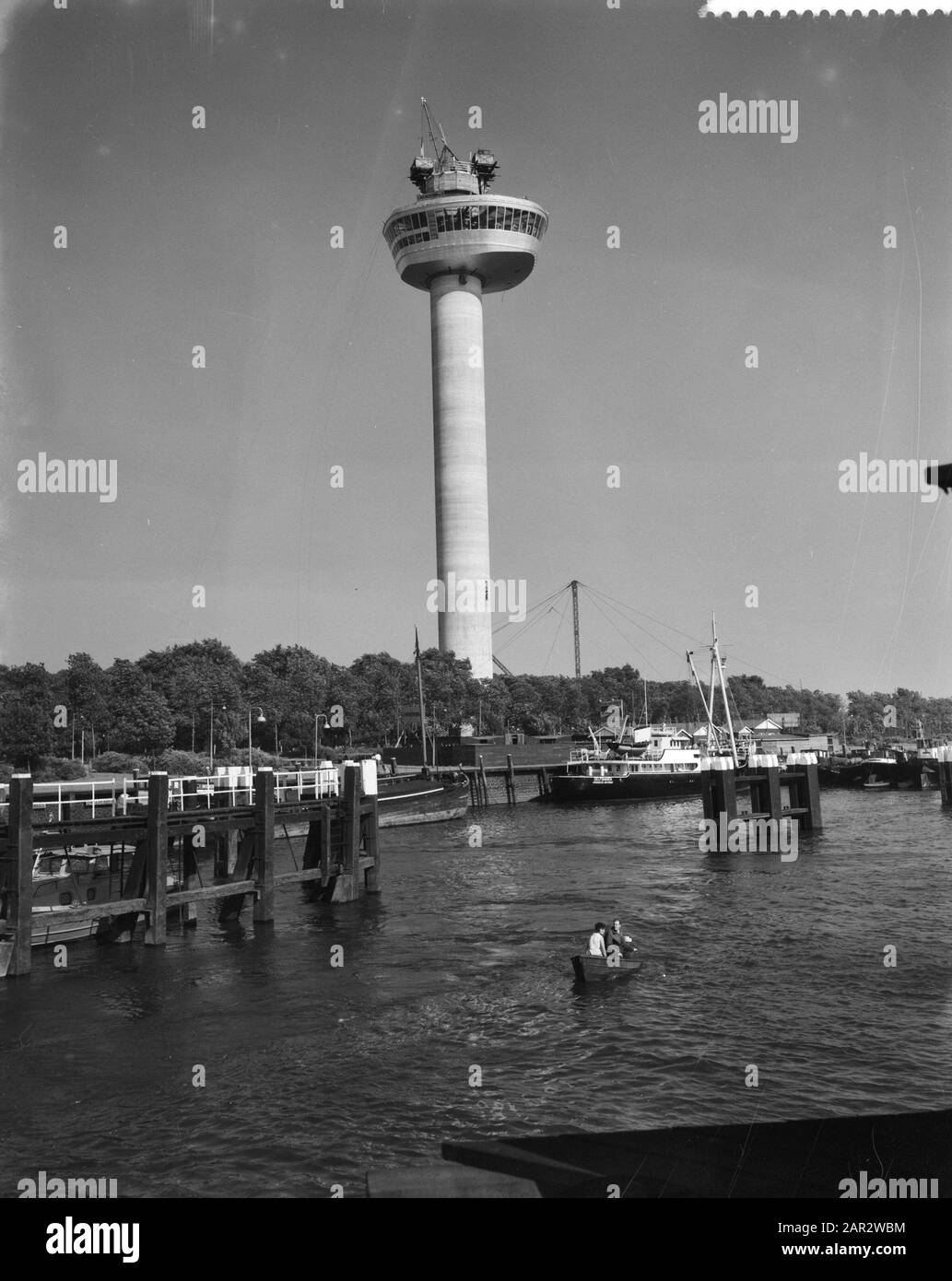 The Euromast  Hoisting the restaurant at the top of the Euromast Annotation: The Euromast (1958-1960) was designed by architect H.A. Maaskant on the occasion of the Floriade in Rotterdam in 1960. is the Euromast designated as National Monument Date: 11 July 1959 Location: Rotterdam, Zuid-Holland Keywords: construction Stock Photo
