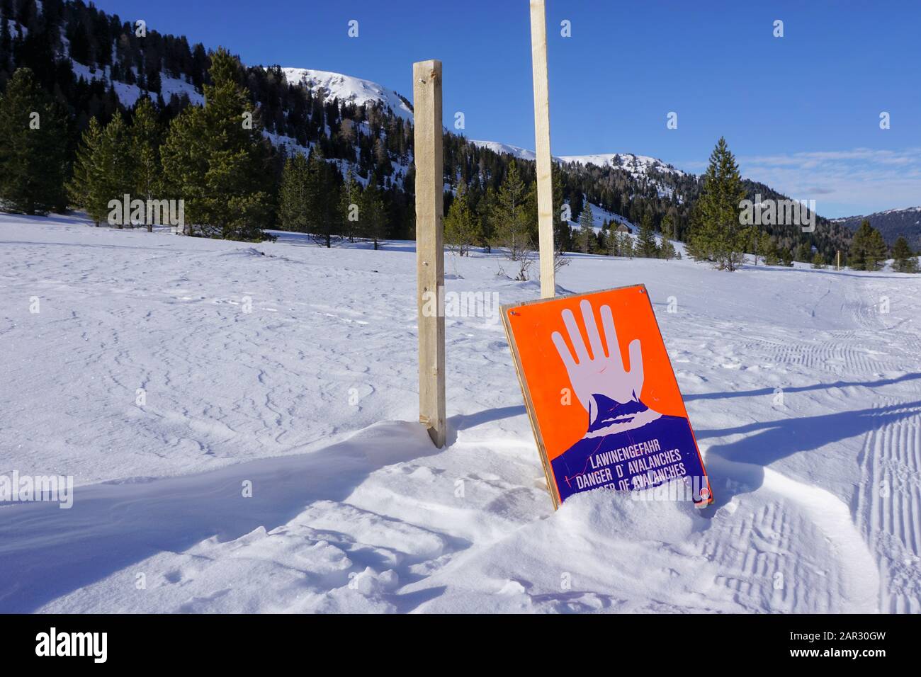 Avalanche area sign alerts winter travelers to possible snow slides in the Alps, Salzburger Land in Austria, Europe. Stock Photo