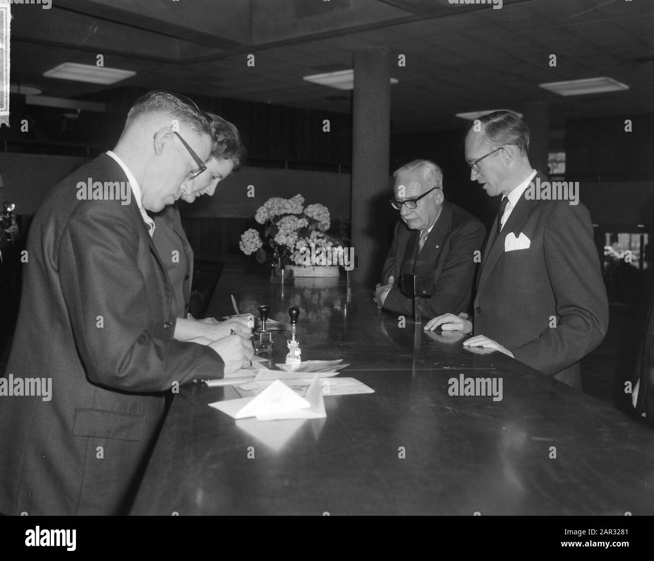 Minister of Finance Prof. mr. H. J. Witteveen new office of the savings bank for the city of Amsterdam at the Singel, Date: 22 april 1964 Location: Amsterdam, Noord-Holland Keywords: SAVING BANKS Personal name: Witteveen, Johan Stock Photo