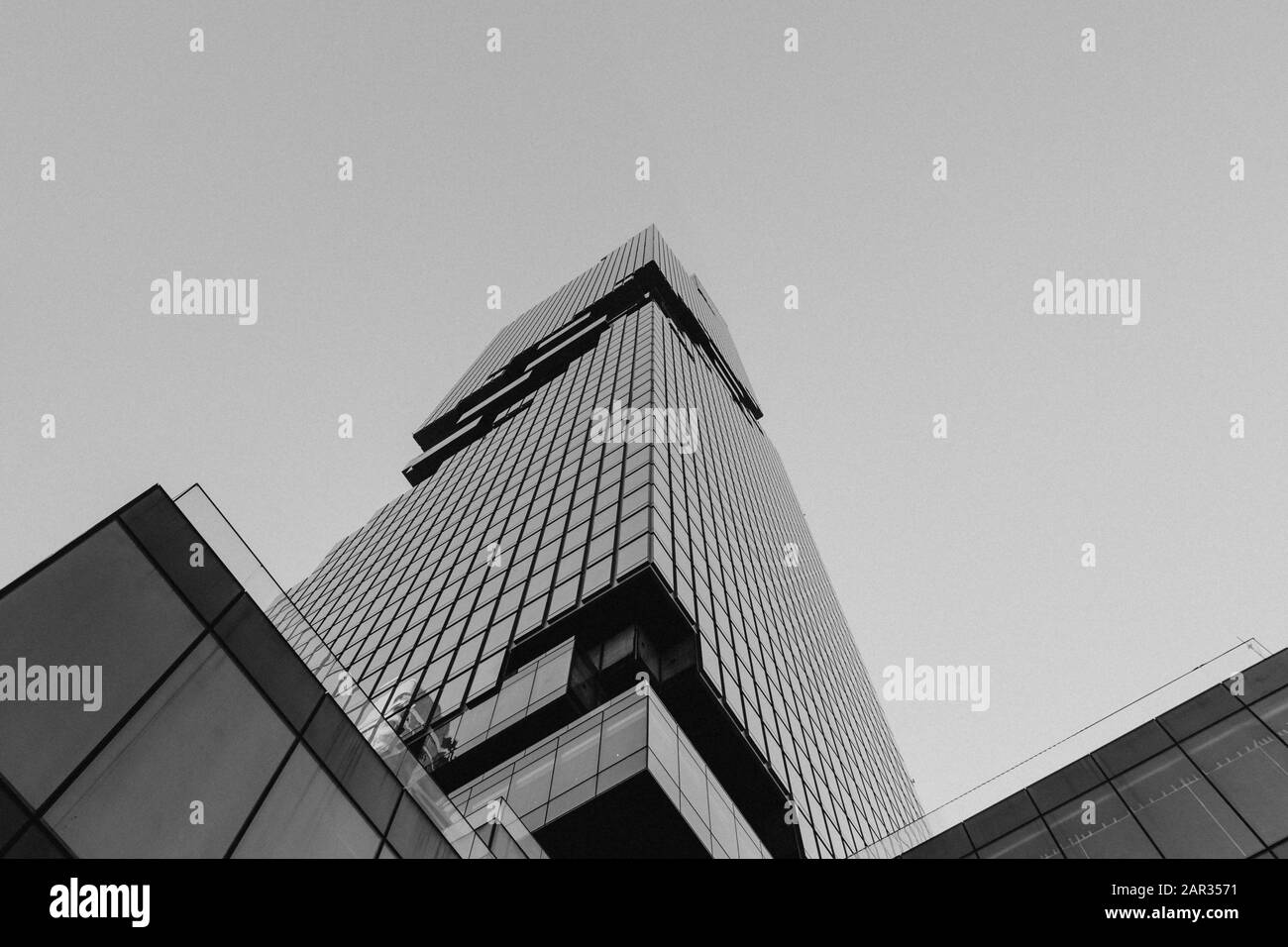 Black and white tone, Low angle view of King power Mahanakhon, modern mix use tower designed by Ole Scheeren the highest skyscraper in Bangkok. Stock Photo