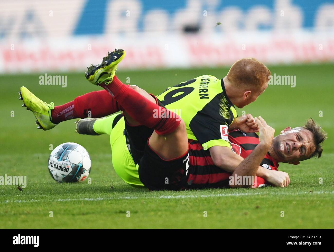 Freiburg, Germany. 25th Jan, 2020. Football: Bundesliga, SC Freiburg - SC Paderborn 07, 19th matchday in the Black Forest Stadium. Sebastian Vasiliadis (l) from Paderborn and Amir Abrashi from Freiburg fight for the ball. Credit: Patrick Seeger/dpa - IMPORTANT NOTE: In accordance with the regulations of the DFL Deutsche Fußball Liga and the DFB Deutscher Fußball-Bund, it is prohibited to exploit or have exploited in the stadium and/or from the game taken photographs in the form of sequence images and/or video-like photo series./dpa/Alamy Live News Stock Photo