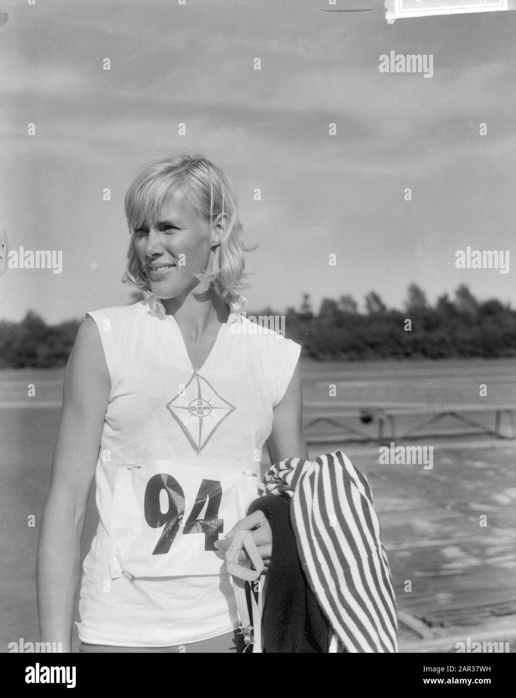 Dutch athletics championships in Groningen, Miss M. Thomas, winner high jump Date: August 14, 1965 Location: Groningen Keywords: athletics, championships, winners Personal name: Thomas, M. Stock Photo