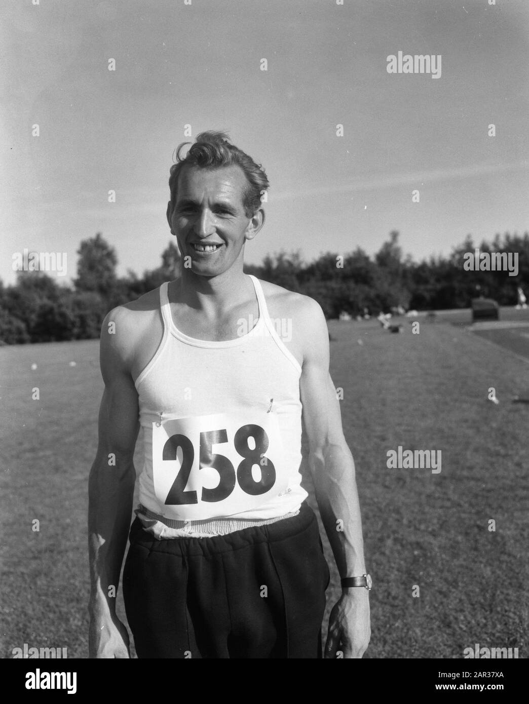 Dutch athletics championships in Groningen, A. Adams champion jumping Date: August 14, 1965 Location: Groningen Keywords: athletics, champion, championships Personal name : A. Adams Stock Photo
