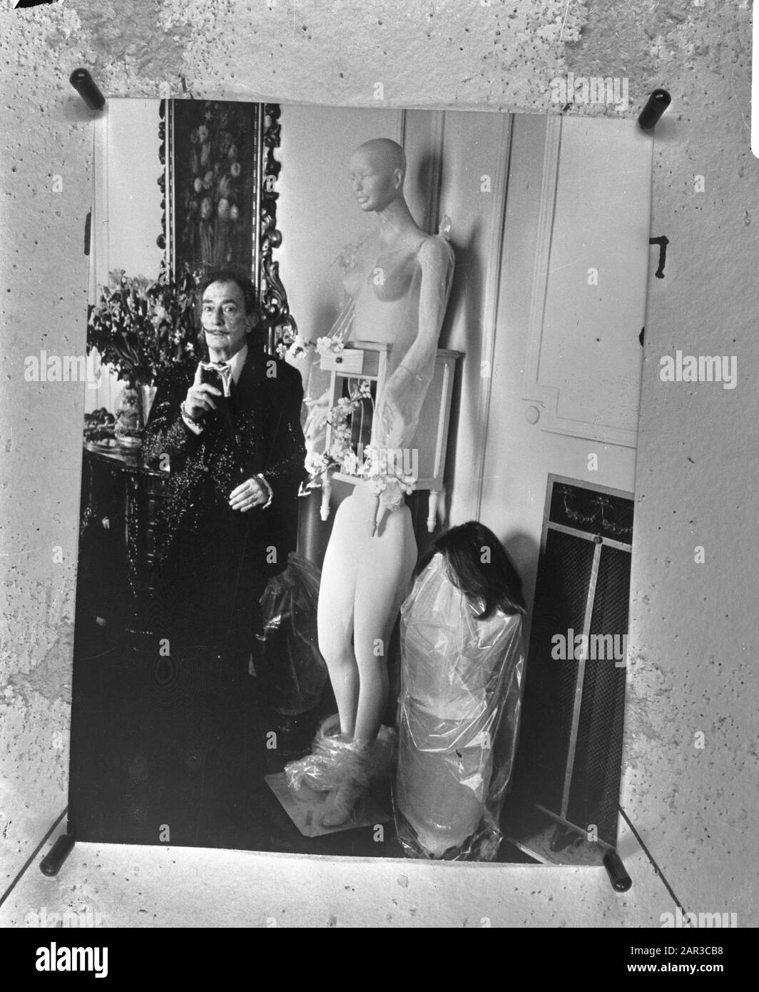 Salvador Dali in Barcelona with bizarre image of woman, for Dalimuseum in Figueras Date: May 29, 1974 Location: Barcelona Keywords: images, women Stock Photo