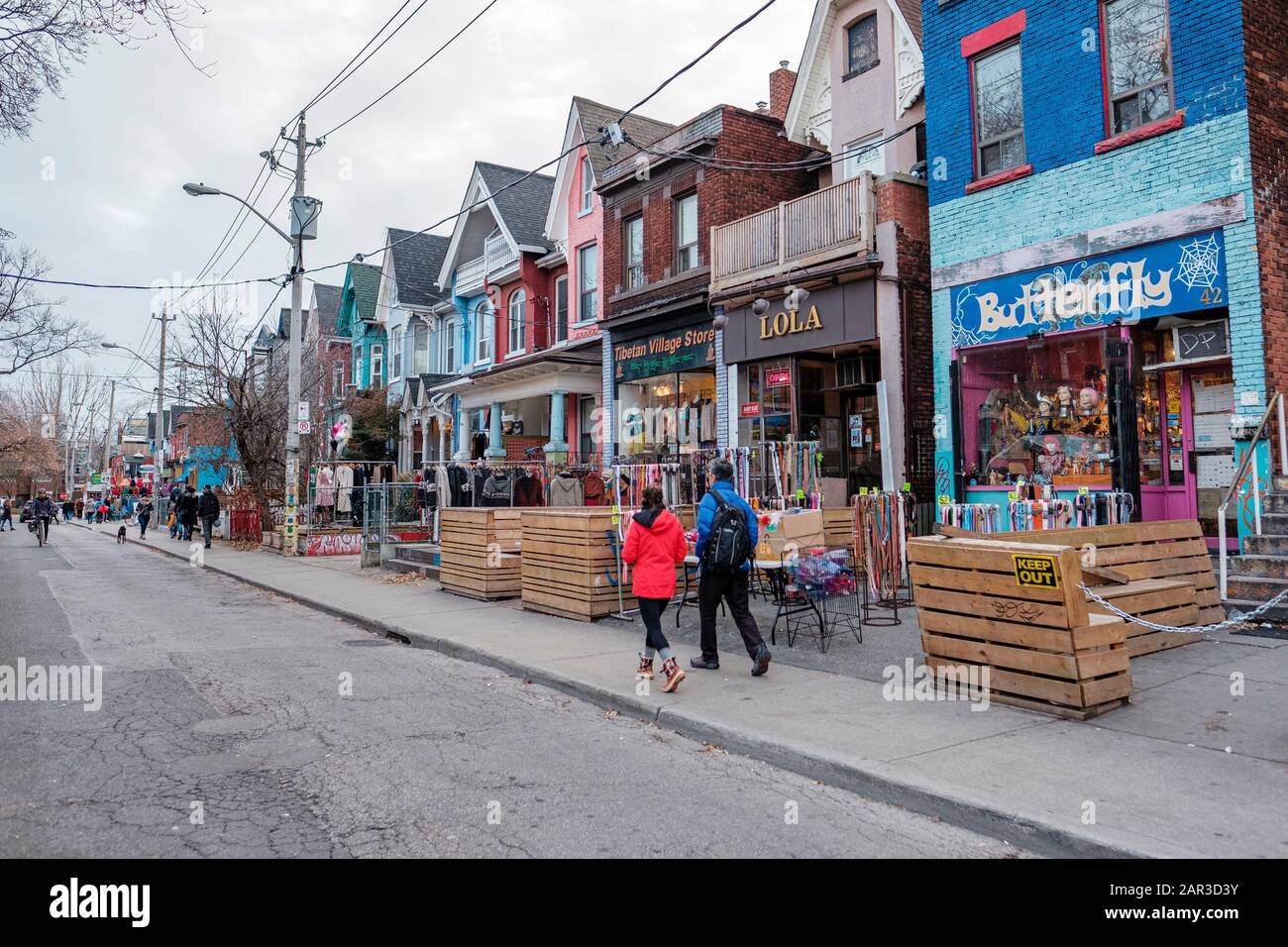Street scene, people walking on sidewalk on Kensington Ave, Kensington Market, street life, downtown Toronto, Ontario, Canada Stock Photo