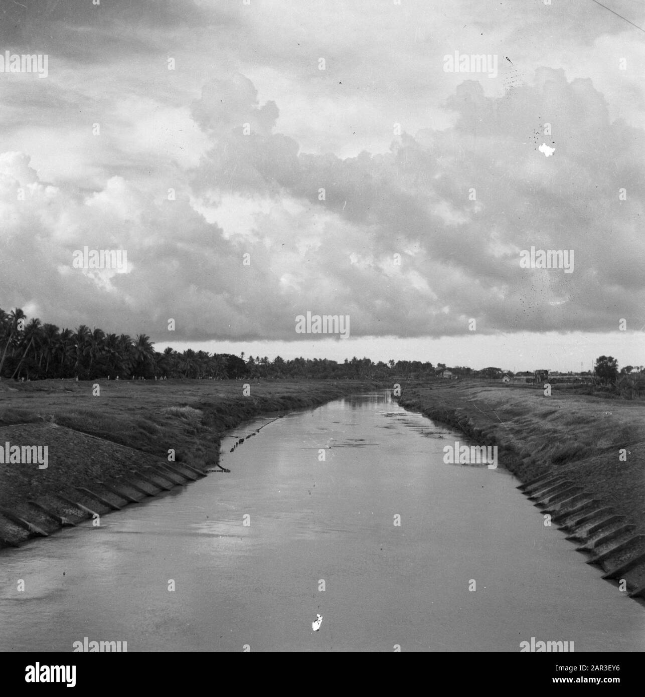 [Channel or river] Date: 1947 Location: Indonesia, Dutch East Indies Stock Photo