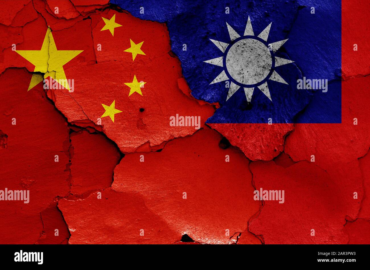 flags of China and Taiwan painted on cracked wall Stock Photo