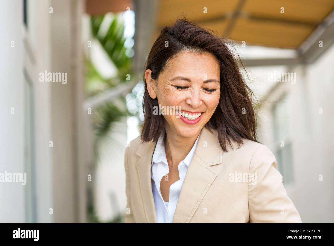 Portrait of a confident Asian businesswoman smiling. Stock Photo