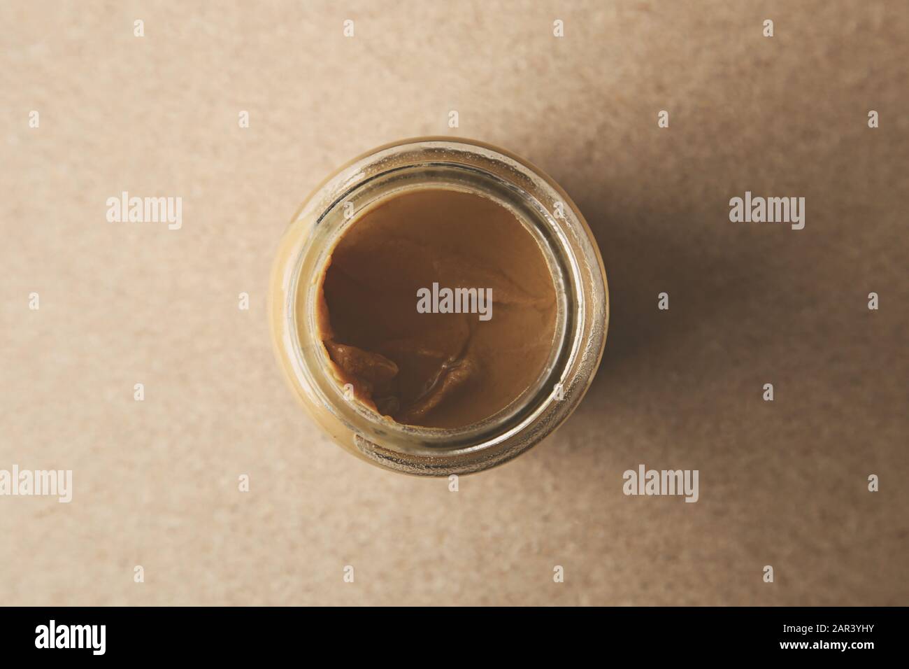 Download A High Angle Shot Of A Jar Of Delicious Peanut Butter On A Wooden Surface Stock Photo Alamy Yellowimages Mockups