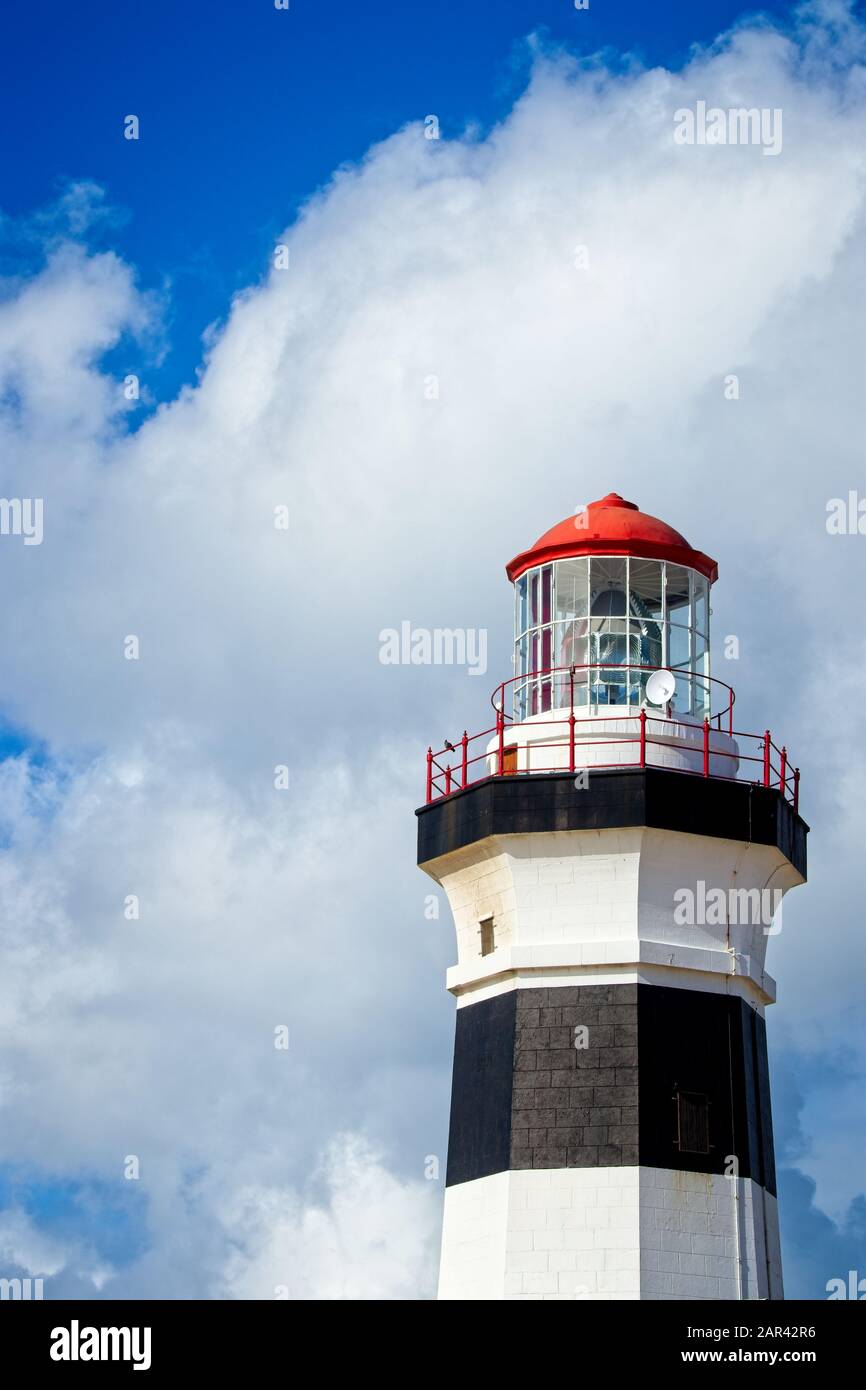 Vertical low angle shot of a lighthouse under the beautiful cloud in ...
