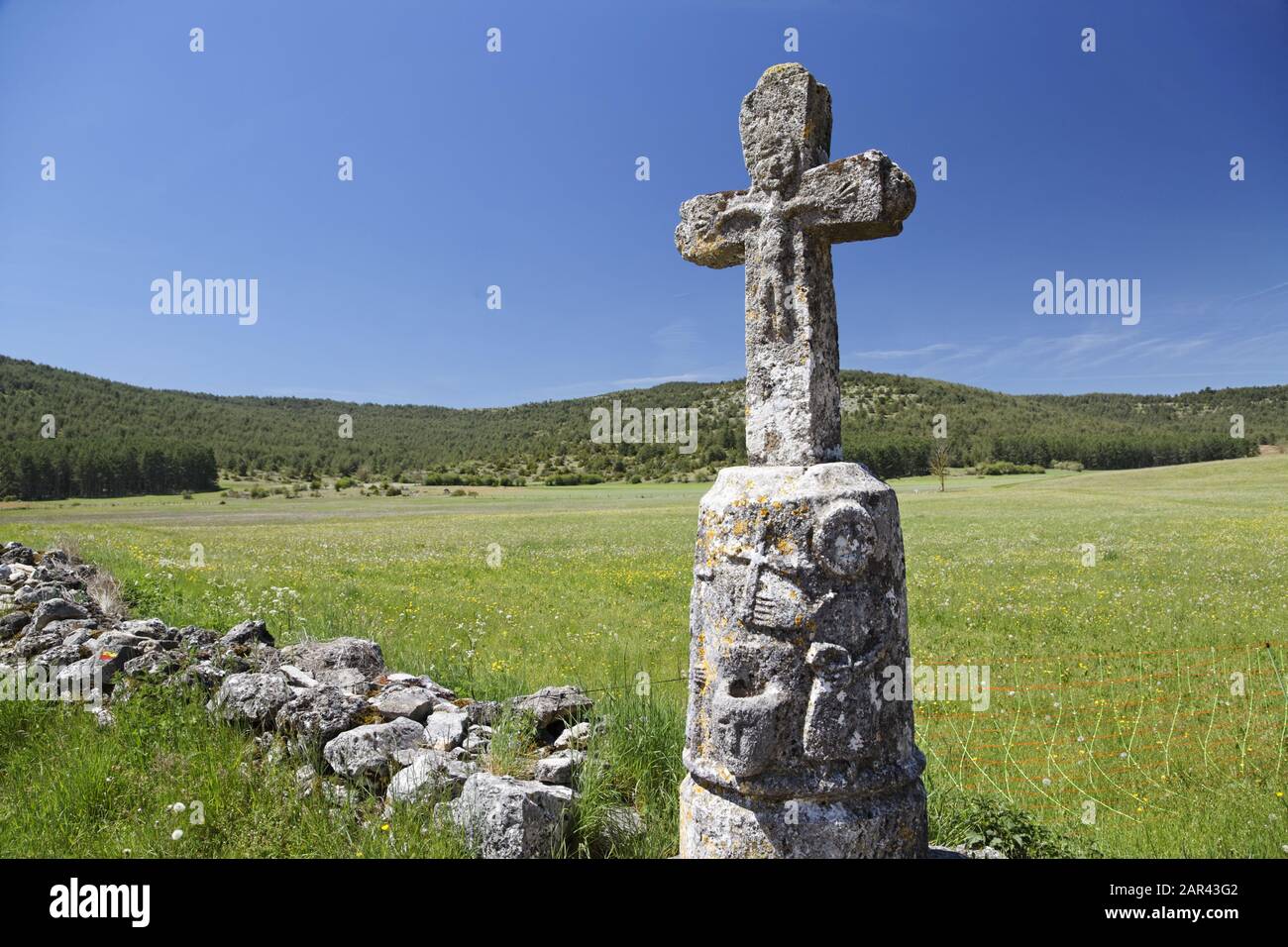 a stone cross near Le Buffre, a tiny village on the Causse Mejean, Lozere Department, France Stock Photo