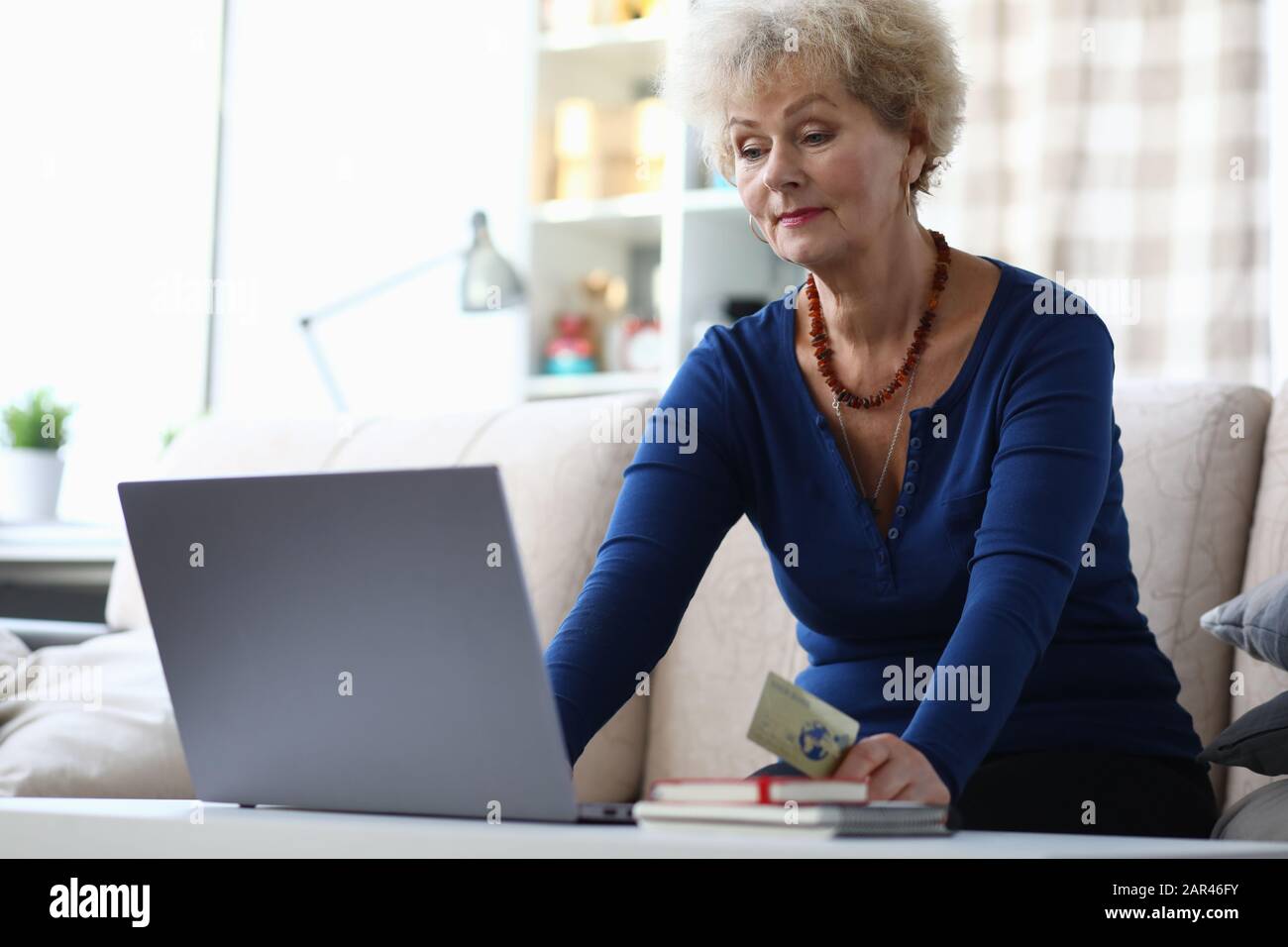 Preppy Grandma Using Computer Granny using the internet hi-res stock photography and images - Alamy