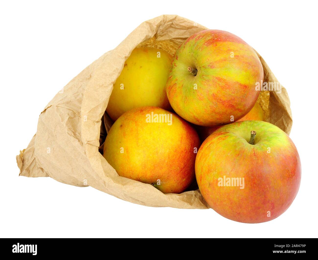 Fresh apples in an environmentally friendly brown paper bag isolated on a white background Stock Photo