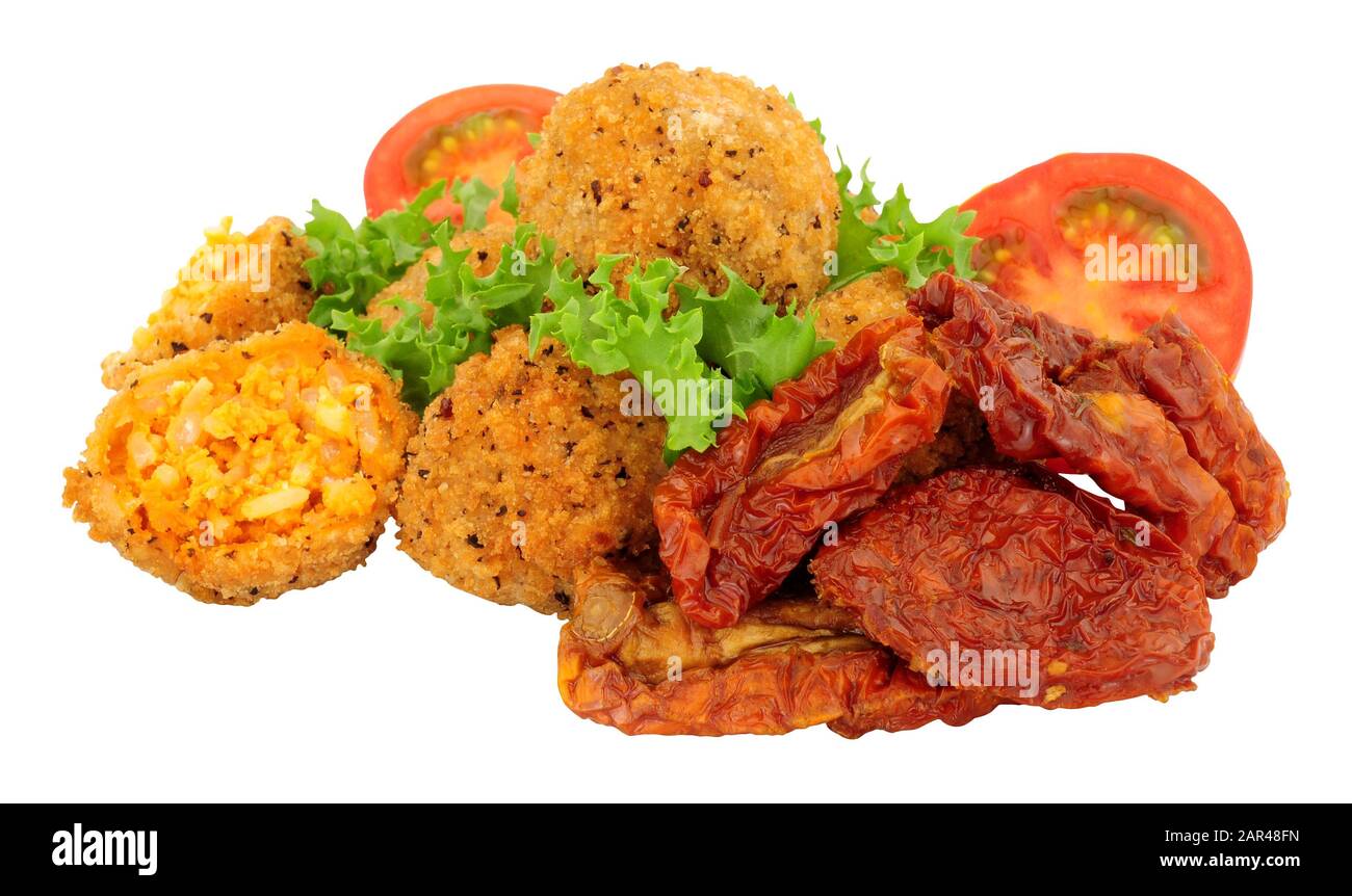 Tomato and basil arancini with sun dried tomatoes isolated on a white background Stock Photo