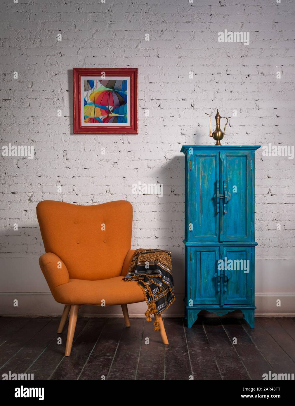 Living Room Corner With Vintage Orange Armchair And Ornate Scarf