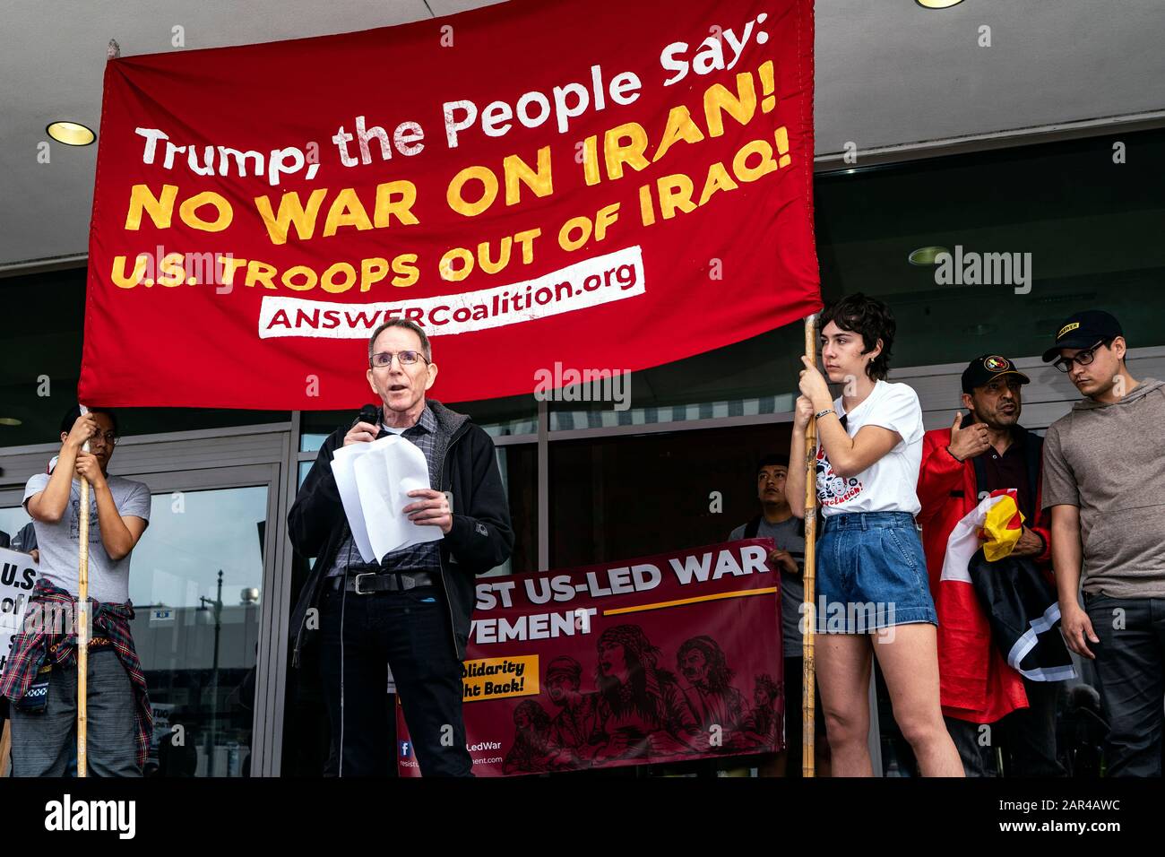 Protesters hold a banner during the demonstration.No War in Iran protest against the Trump Administration’s military actions and economic sanctions against Iran. Organizers called on Trump to withdraw U.S. troops from Iraq and not to drag the U.S. into a war in the Middle East. Stock Photo