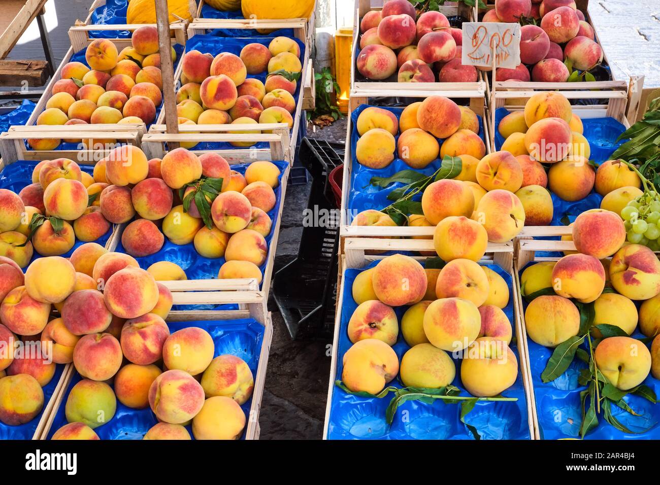 Peaches and nectarines for sale at a market Stock Photo Alamy