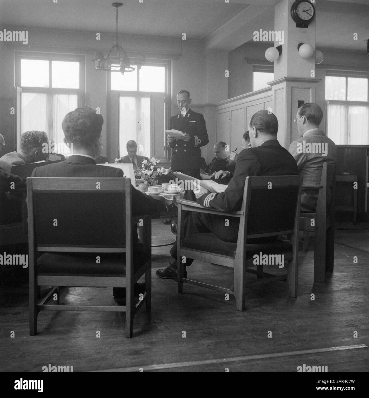 Prins Bernhard visits Demobilisationentrum Voorschoten  Prins Bernhard in discussion with company Date: May 12, 1948 Location: Voorschoten, Zuid-Holland Keywords: demobilisation centers, armed forces Personal name: Bernhard (prince Netherlands) Stock Photo