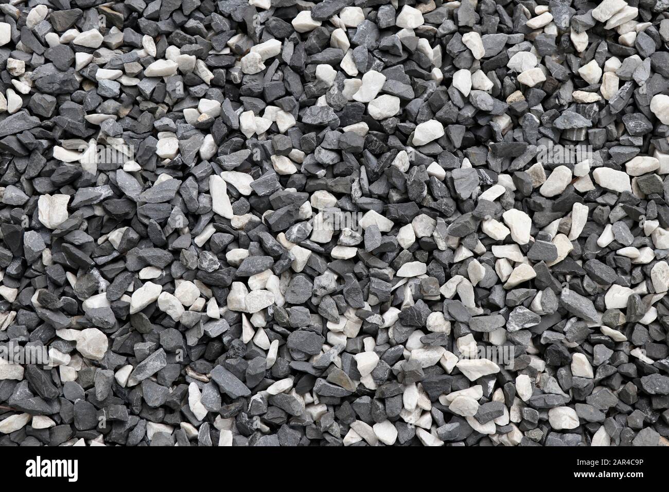 Black and white gravel background. Black and white stone background. Stock Photo