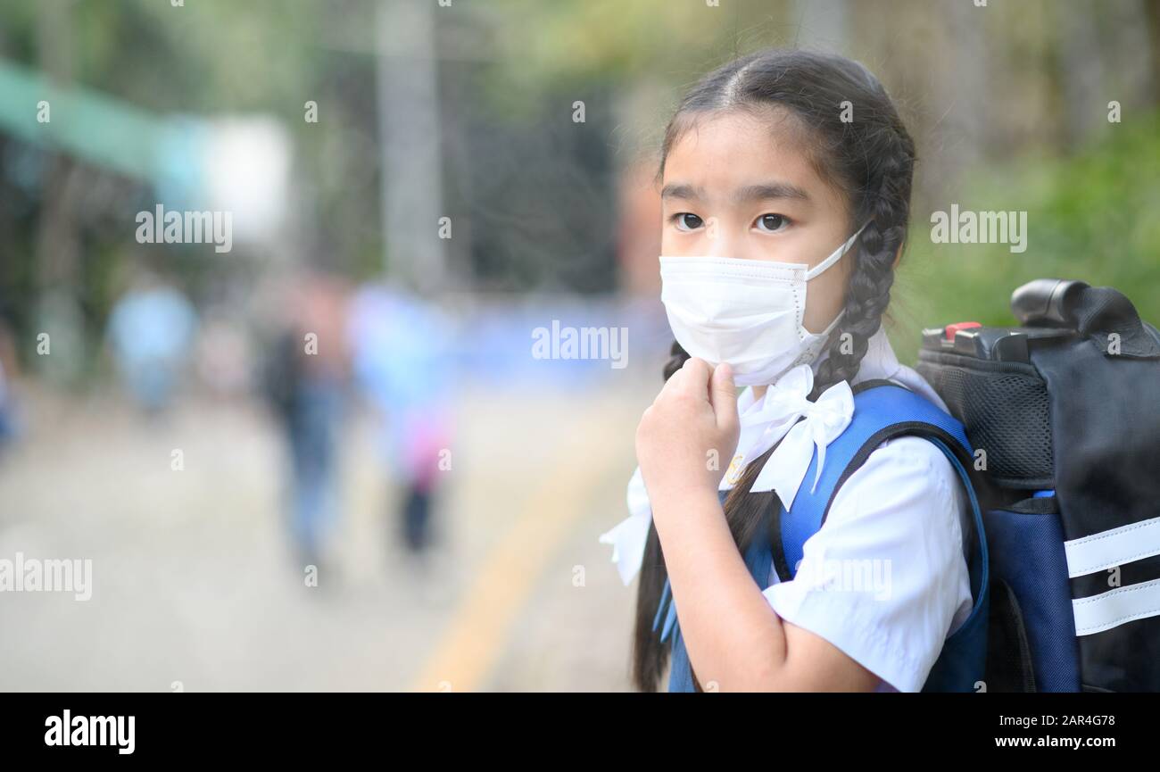Portrait Asian children girl wear mask to protect PM 2.5 dust and air ...