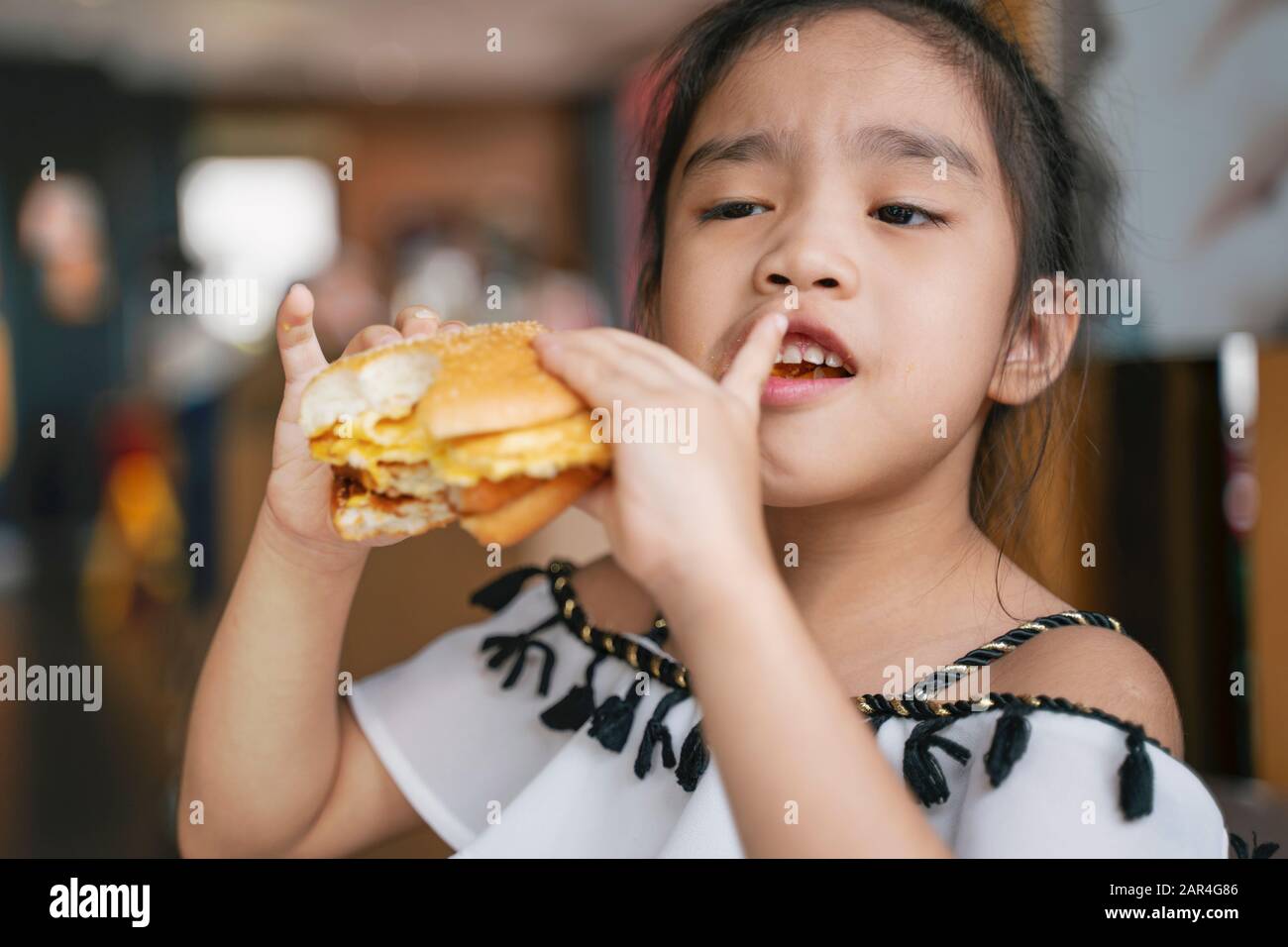 asian Children eat chicken cheese Hamburger Food Court Stock Photo Alamy