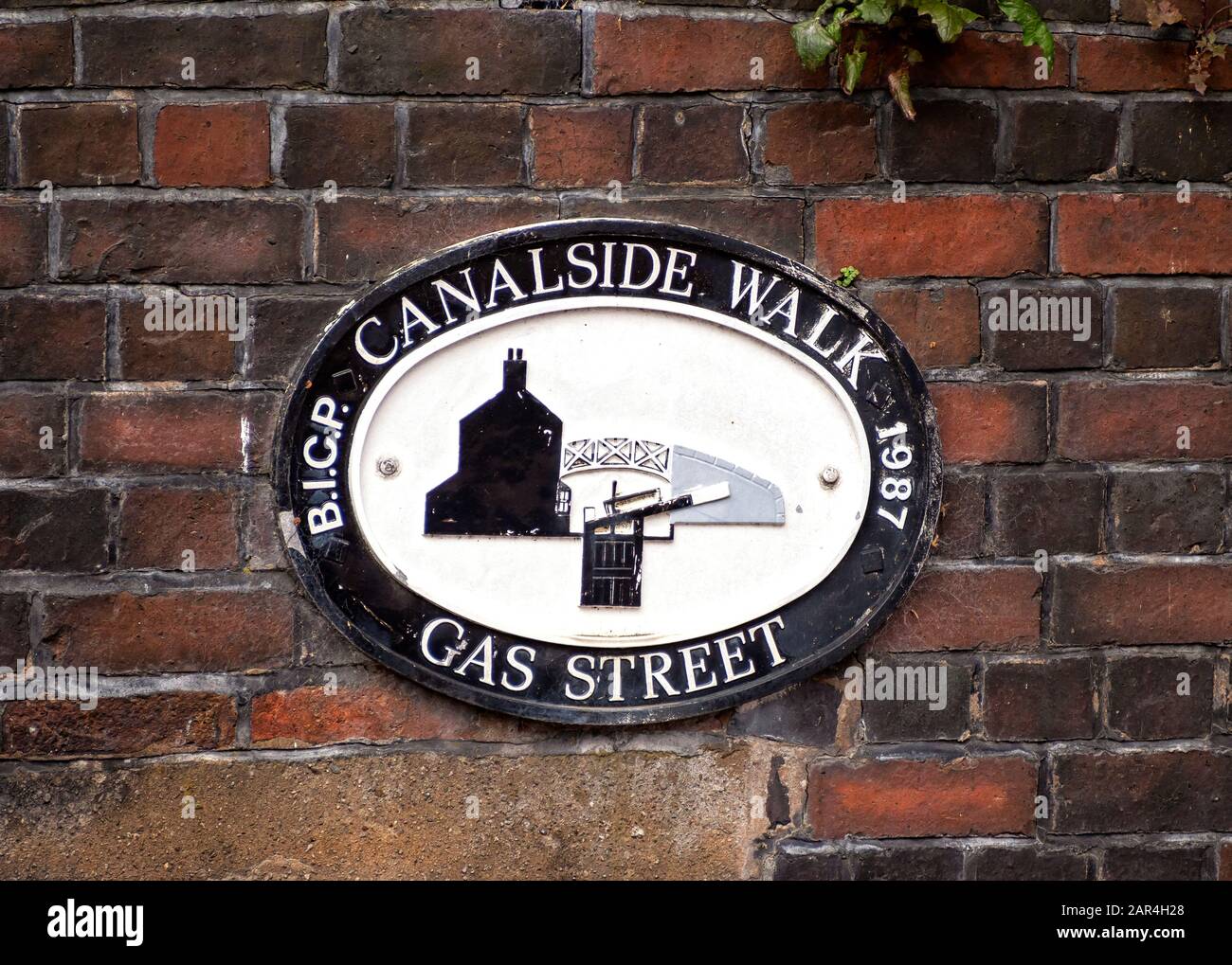BIRMINGHAM, UK - MAY 28, 2019:  Old sign on a brick for canalside walk at Gas Street, Brindley Place Stock Photo
