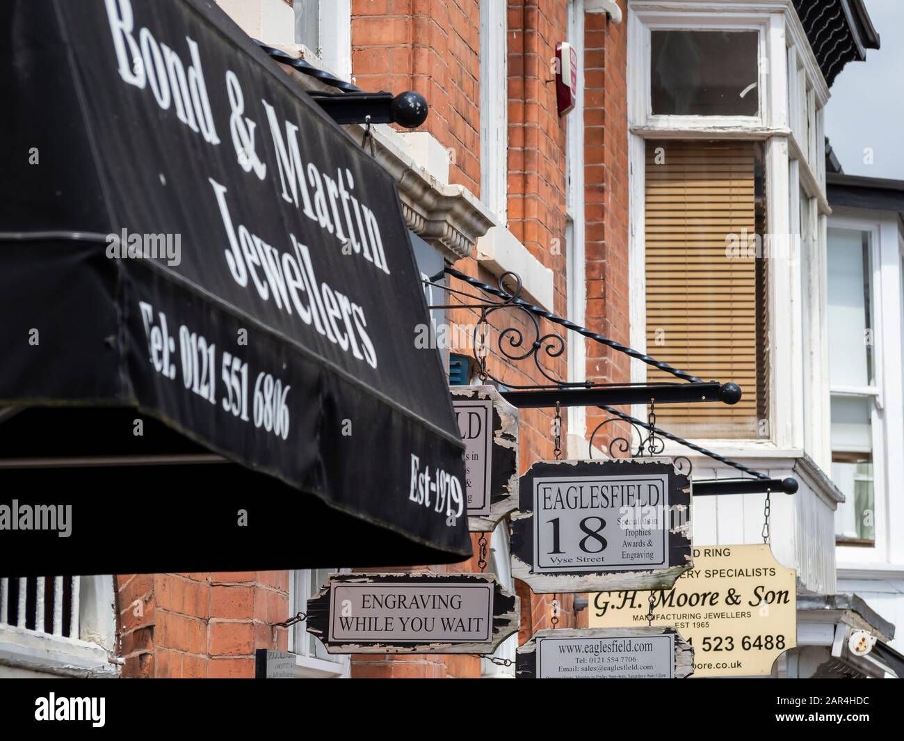 BIRMINGHAM, UK - MAY 28, 2019:  Signs for Jewellery shops in Vyse Street in the Jewellery Quarter Stock Photo