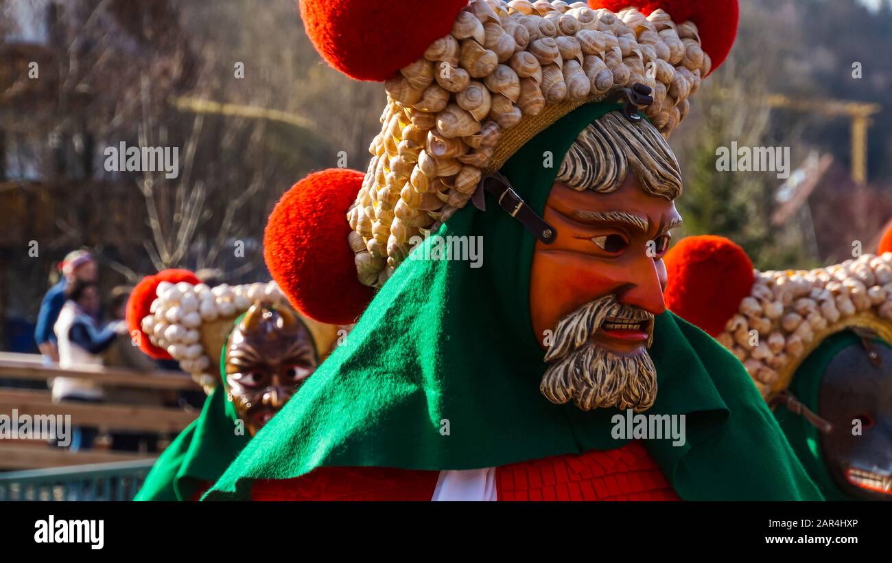 Elzach, Germany, February 25, 2017, Close up shot of a face mask and costume of people celebrating carnival in black forest village Stock Photo