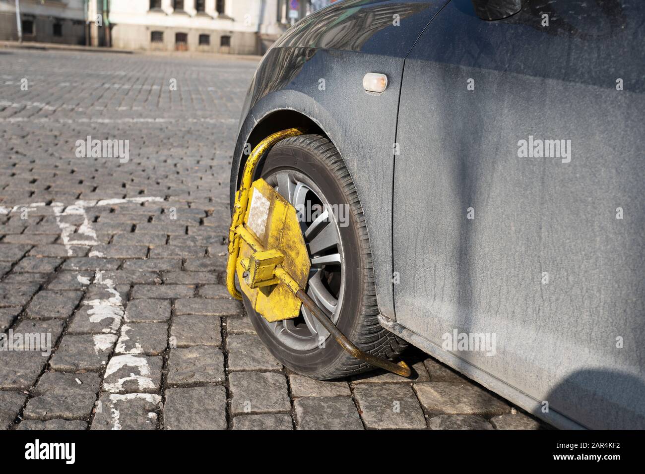 Wheel Clamp-on an illegally parked vehicle Stock Photo