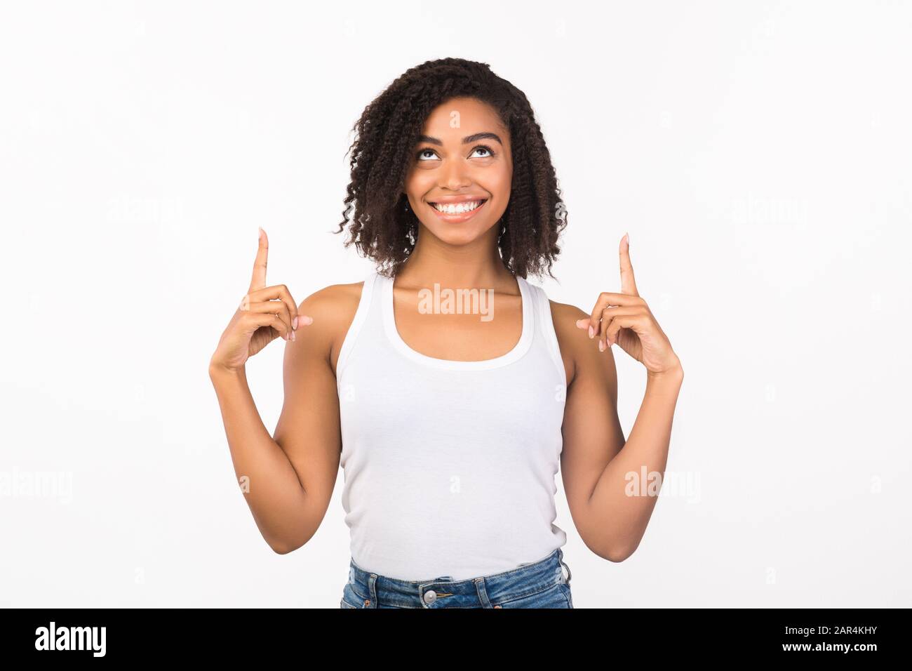 Satisfied woman pointing blank hi-res stock photography and images - Alamy