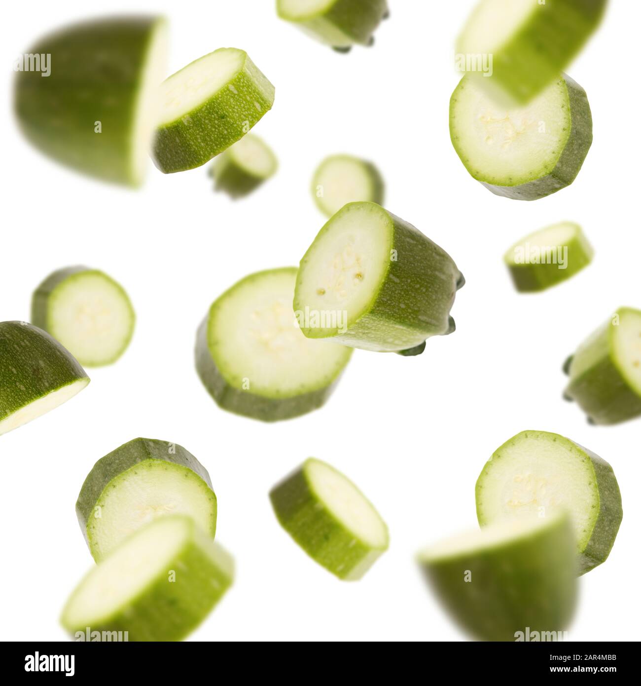 Flying squashes slices isolated on white background Stock Photo