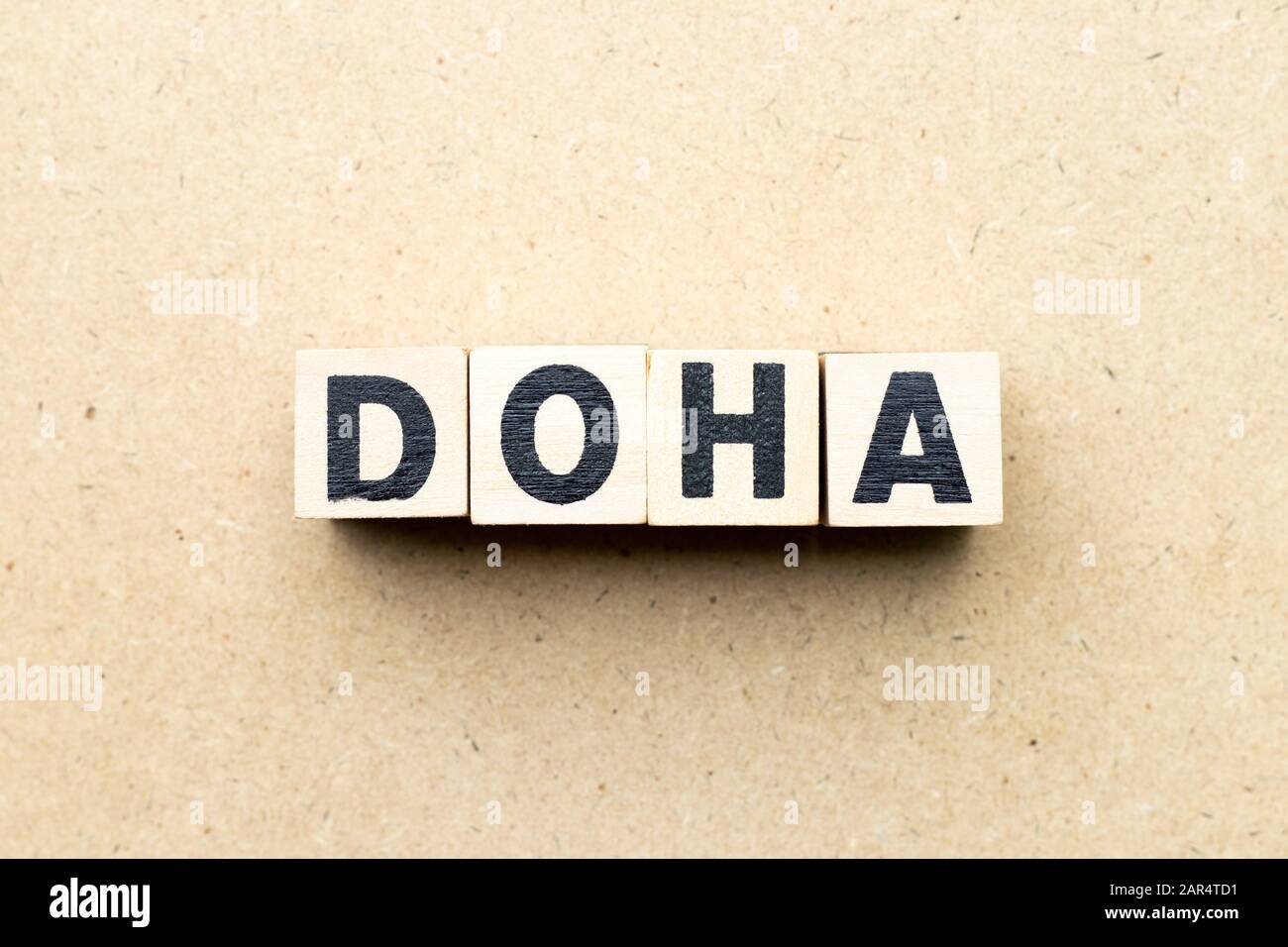 Letter block in word Doha on wood background Stock Photo - Alamy