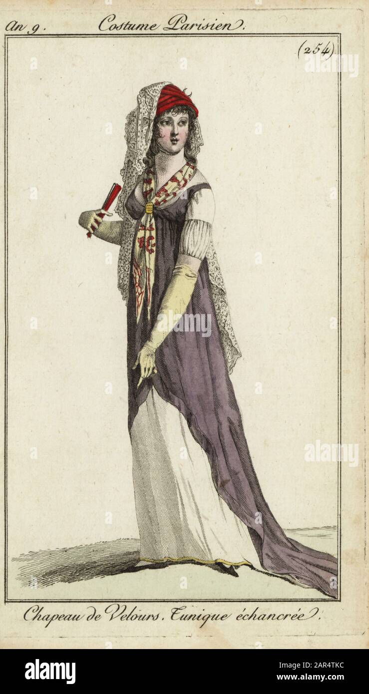 Fashionable woman with a fan, 1800. She wears a velvet hat with veil and a  decollete tunic dress with fichu tied on the bust. Chapeau de Velours.  Tunique echancreee. Handcoloured copperplate engraving