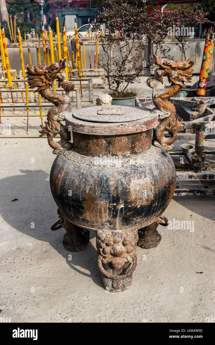 Metal incense burner and incense sticks in Po Lin Monastery, Lantau Island, Hong Kong Stock