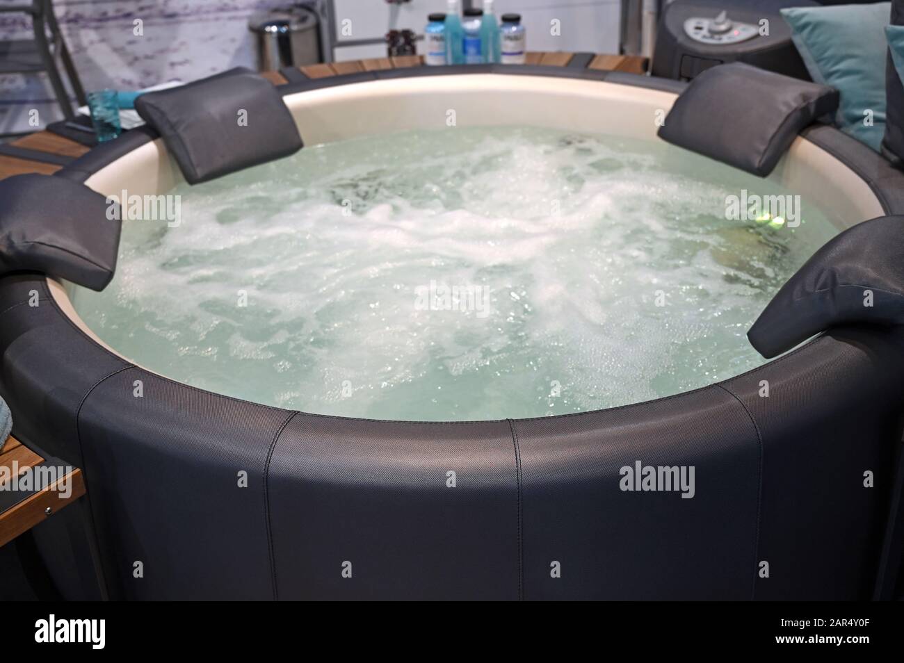 round jacuzzi with water in the bathroom Stock Photo